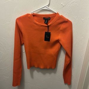 orange long sleeve top, goes great with jeans and sweatpants!